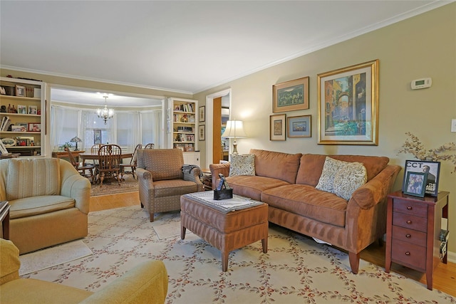 7 Southminster Dr, White Plains, NY 10604 - living room featuring ornamental molding, wood finished floors, a chandelier, and built in shelves