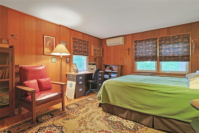 7 Southminster Dr, White Plains, NY 10604 - bedroom with a wall mounted AC, wooden walls, wood finished floors, and an office area
