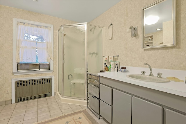 7 Southminster Dr, White Plains, NY 10604 - bathroom featuring radiator, vanity, a shower stall, and tile patterned floors