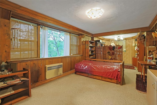 7 Southminster Dr, White Plains, NY 10604 - bedroom with wood walls, carpet flooring, a textured ceiling, and a wall unit AC
