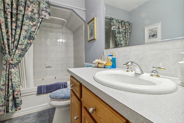 bathroom with shower / bath combination with curtain, vanity, toilet, and tile patterned flooring