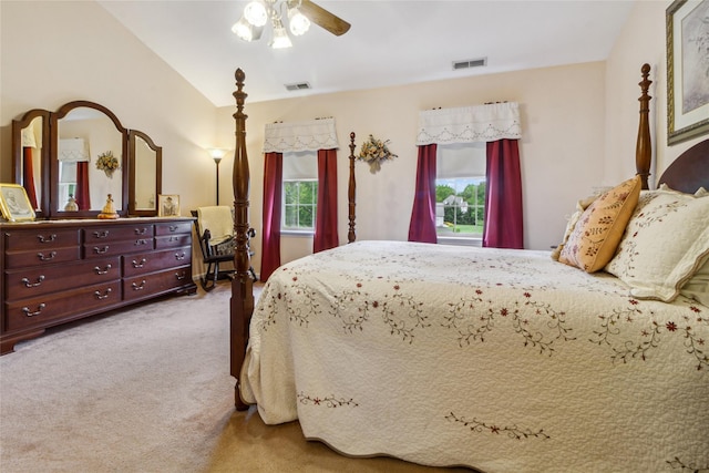 bedroom with carpet flooring, a ceiling fan, and lofted ceiling