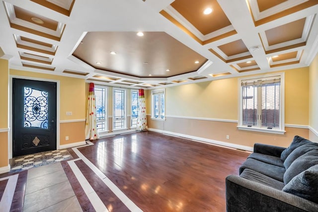 lobby featuring coffered ceiling, crown molding, and beamed ceiling