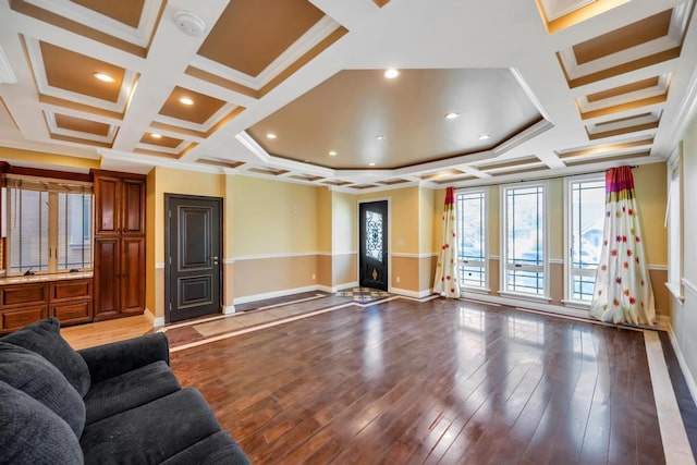 community lobby featuring coffered ceiling, crown molding, and beam ceiling