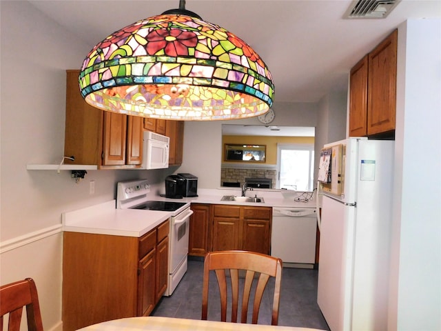 42 Touchstone Way, Millwood, NY 10546 - kitchen featuring white appliances, brown cabinets, and light countertops