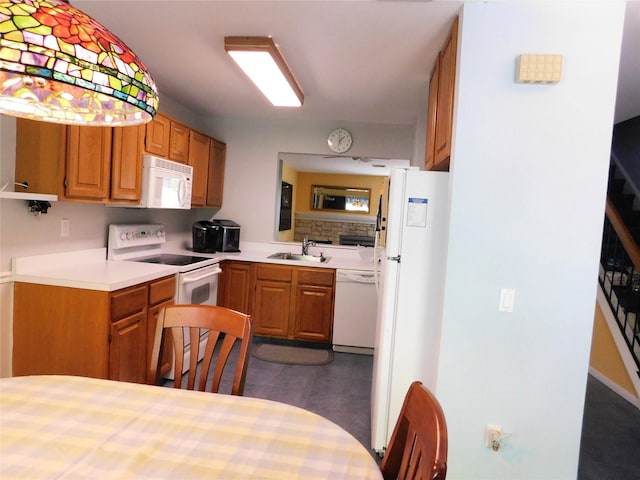 42 Touchstone Way, Millwood, NY 10546 - kitchen featuring white appliances, light countertops, tasteful backsplash, and brown cabinets