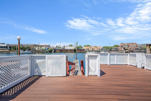 15940 95th St, Howard Beach, NY 11414 - dock area featuring a deck with water view