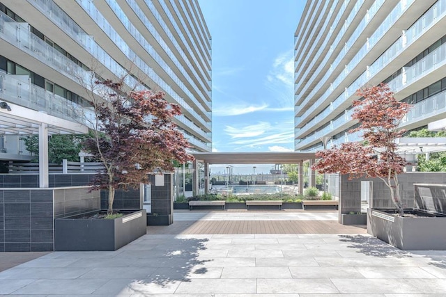 surrounding community featuring a pergola
