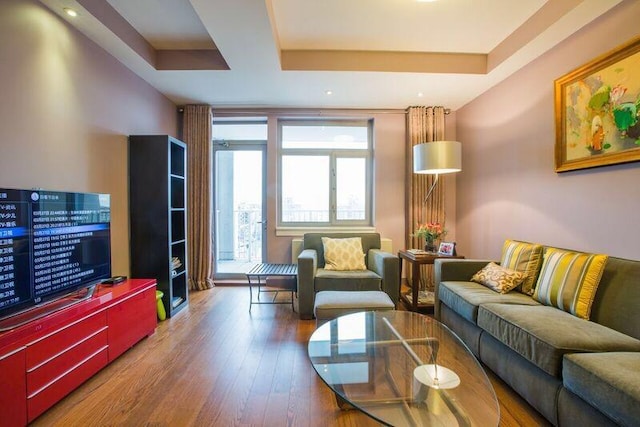 living area featuring hardwood / wood-style floors