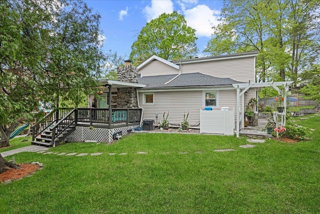 back of property featuring a wooden deck, a pergola, and a chimney