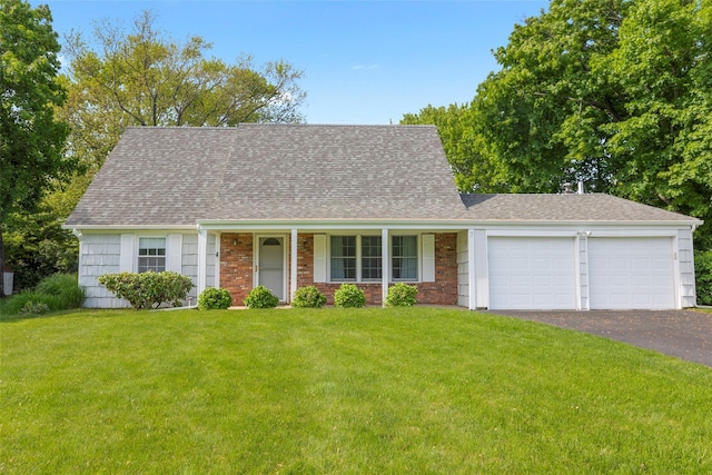 7 Pheasant Ct, Stony Brook, NY 11790 - view of front facade with an attached garage, driveway, a shingled roof, and a front yard