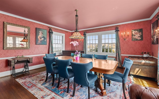 dining area with wallpapered walls, hardwood / wood-style floors, crown molding, and baseboards