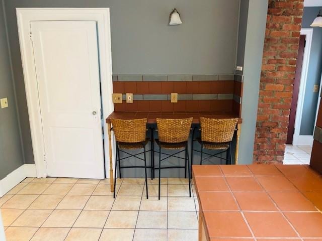 1358 Rte 44, Pleasant Valley, NY 12569 - dining space with light tile patterned floors and baseboards
