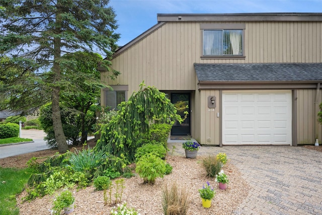 41 Heritage Hills Dr Unit A, Somers, NY 10589 - view of front of home featuring an attached garage, driveway, and a shingled roof