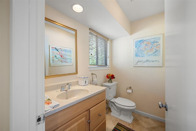 41 Heritage Hills Dr Unit A, Somers, NY 10589 - bathroom with toilet, vanity, baseboards, and tile patterned floors