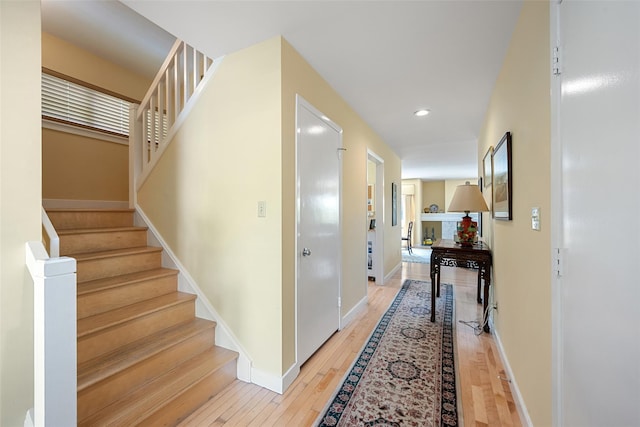 41 Heritage Hills Dr Unit A, Somers, NY 10589 - hall featuring light wood-style floors, stairway, recessed lighting, and baseboards