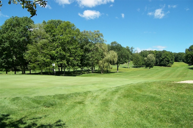 41 Heritage Hills Dr Unit A, Somers, NY 10589 - surrounding community featuring view of golf course, a yard, and view of wooded area