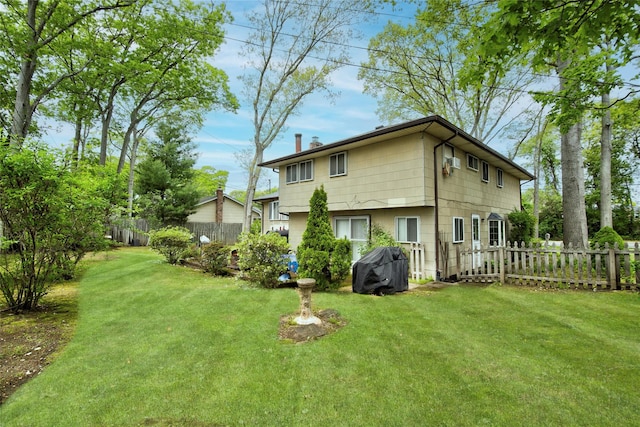 76 Moriches Rd, Lake Grove, NY 11755 - back of property featuring a chimney