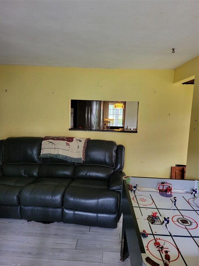 76 Moriches Rd, Lake Grove, NY 11755 - living room featuring wood finished floors