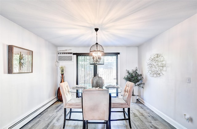 10 Butler Dr, Goshen, NY 10924 - dining room featuring baseboard heating, an AC wall unit, light wood finished floors, and a chandelier