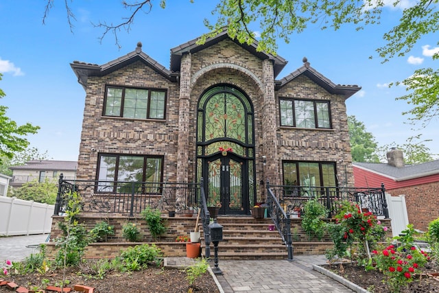 63-41 252nd St, Little Neck, NY 11362 - view of front of property with brick siding and french doors