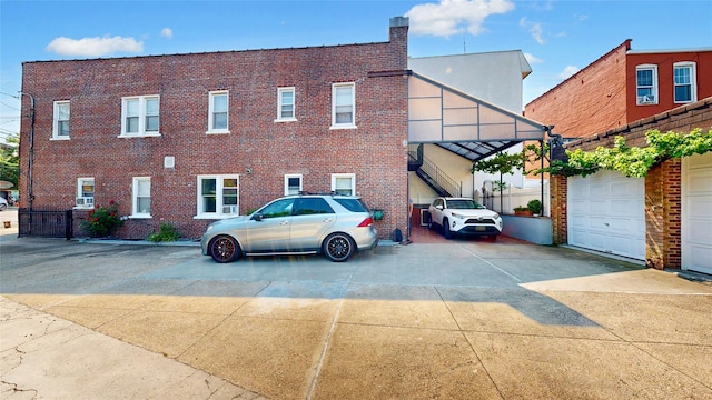 view of property with driveway