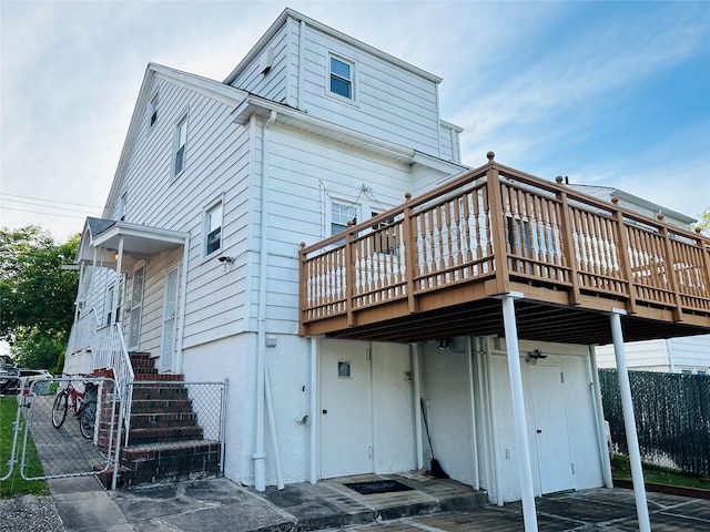 3611 204th St, Bayside, NY 11361 - back of house featuring a wooden deck
