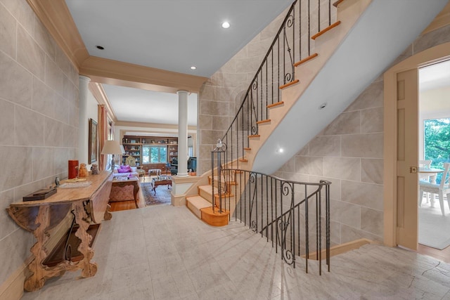 1 Wensley Dr, Great Neck, NY 11021 - foyer with tile walls, plenty of natural light, decorative columns, and recessed lighting
