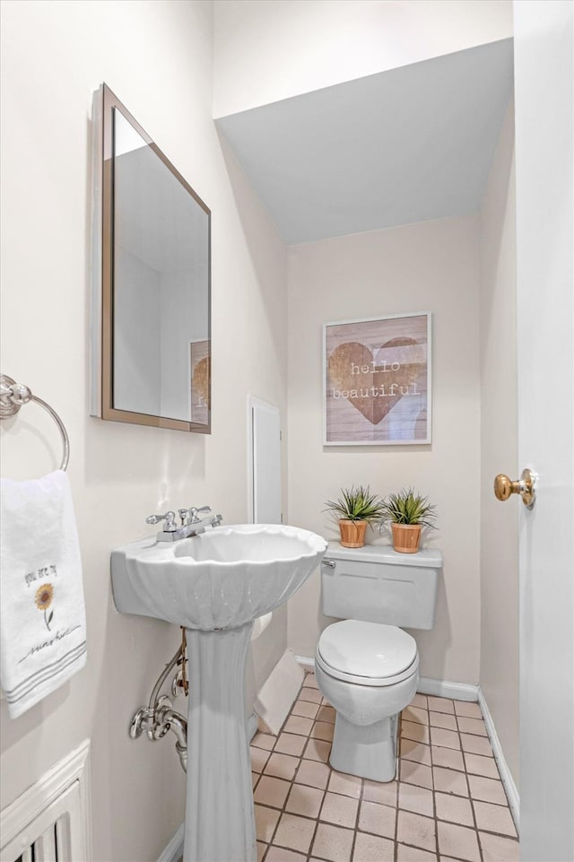 1 Wensley Dr, Great Neck, NY 11021 - bathroom with toilet, baseboards, and tile patterned flooring