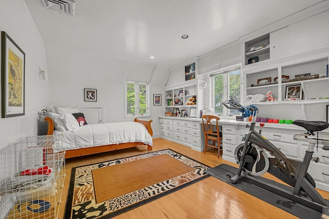 1 Wensley Dr, Great Neck, NY 11021 - bedroom with light wood-style flooring, multiple windows, and recessed lighting