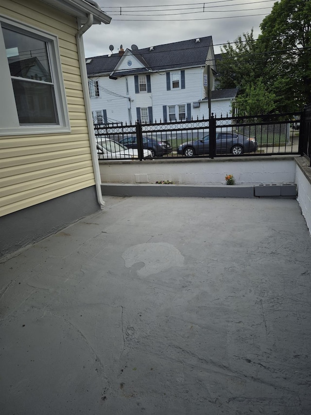 12702 97th Ave, Richmond Hill S, NY 11419 - view of patio with fence