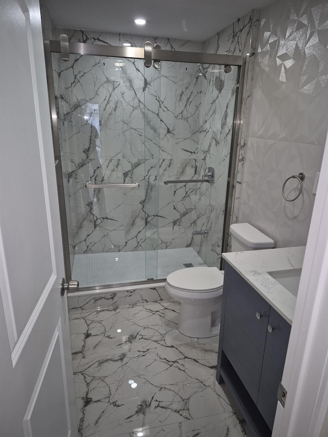 12702 97th Ave, Richmond Hill S, NY 11419 - full bath featuring marble tiled flooring, toilet, vanity, and a marble finish shower