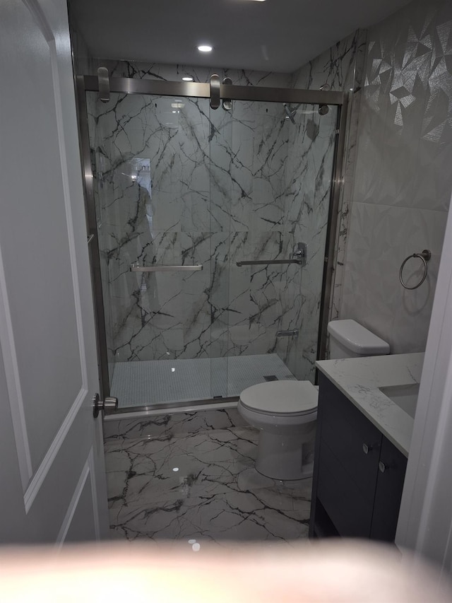 12702 97th Ave, Richmond Hill S, NY 11419 - full bath featuring marble finish floors, toilet, vanity, a marble finish shower, and recessed lighting