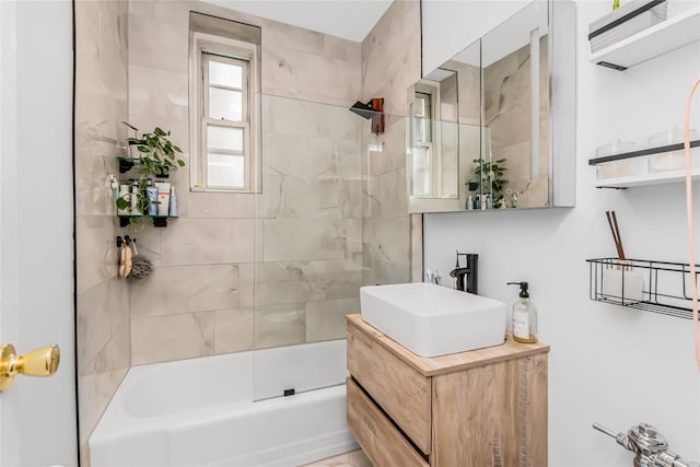 full bathroom with vanity and tub / shower combination