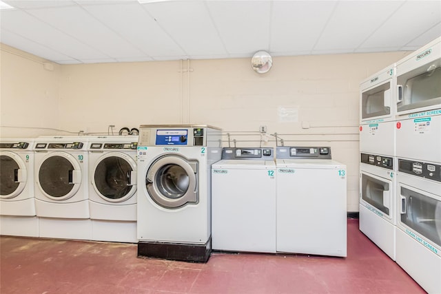 shared laundry featuring stacked washing machine and dryer and separate washer and dryer