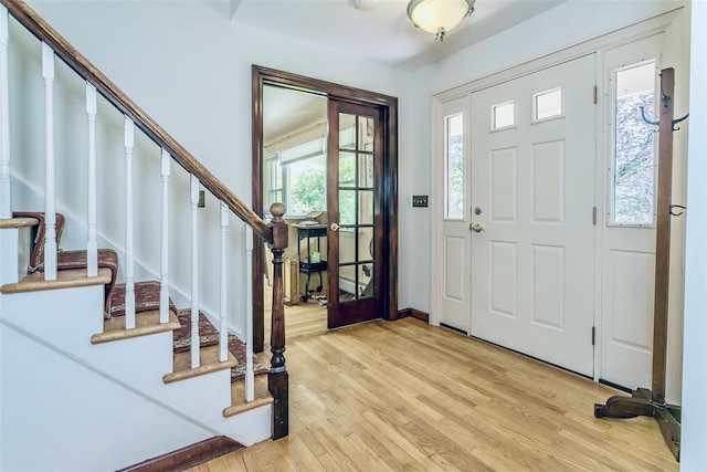 24 Overhill Ln, Warwick, NY 10990 - entrance foyer featuring stairway, light wood-style floors, and baseboards