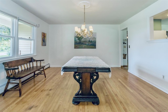 24 Overhill Ln, Warwick, NY 10990 - playroom with light wood-style flooring, baseboards, and a chandelier