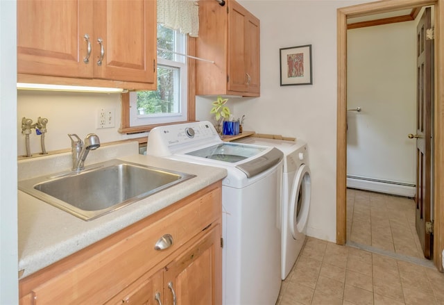 24 Overhill Ln, Warwick, NY 10990 - laundry room featuring a baseboard radiator, separate washer and dryer, cabinet space, and light tile patterned flooring