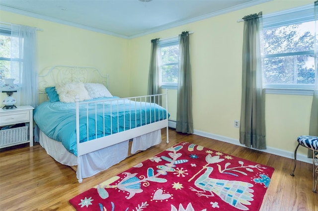 24 Overhill Ln, Warwick, NY 10990 - bedroom featuring crown molding, wood finished floors, and baseboards