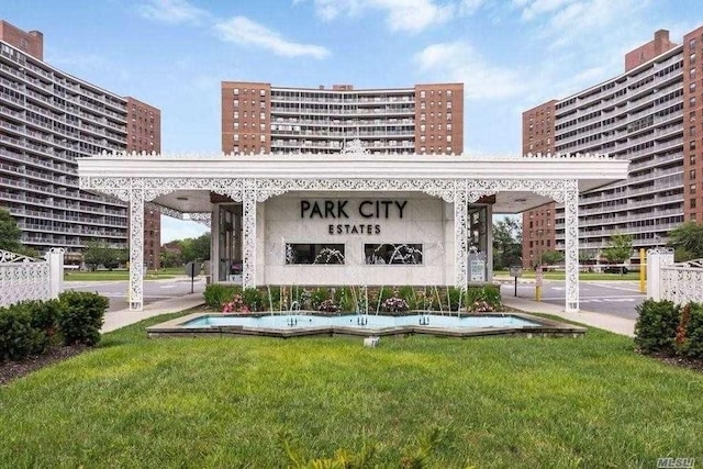 61-35 98th St Unit 4J, Rego Park, NY 11374 - community / neighborhood sign featuring a lawn