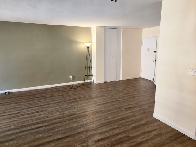 61-35 98th St Unit 4J, Rego Park, NY 11374 - unfurnished room featuring dark wood-type flooring and baseboards