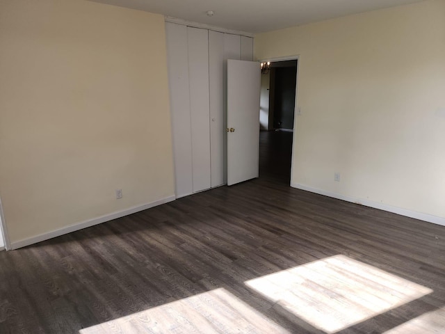 61-35 98th St Unit 4J, Rego Park, NY 11374 - spare room with dark wood finished floors and baseboards
