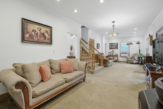 living area featuring light carpet, ornamental molding, recessed lighting, and stairs