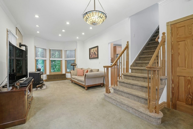 living area featuring recessed lighting, carpet flooring, ornamental molding, stairway, and a wood stove