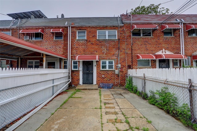 122-52 Springfield Blvd, Springfield Gardens, NY 11413 - back of house with brick siding and fence