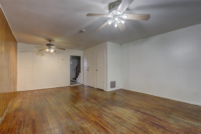 122-52 Springfield Blvd, Springfield Gardens, NY 11413 - unfurnished room featuring a ceiling fan, hardwood / wood-style floors, stairs, and baseboards