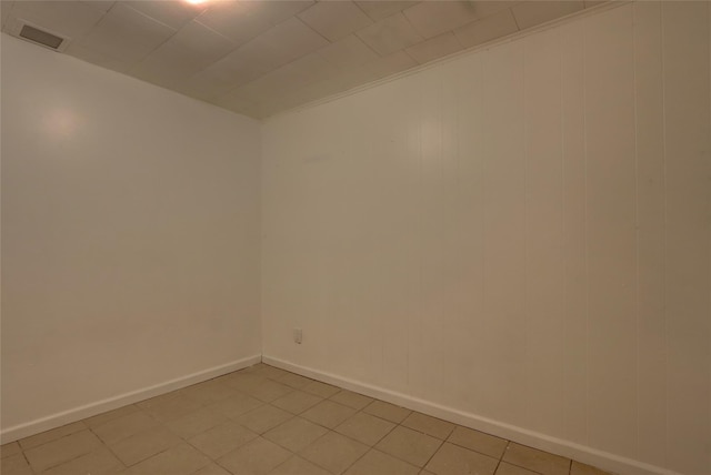 122-52 Springfield Blvd, Springfield Gardens, NY 11413 - spare room featuring baseboards and light tile patterned floors