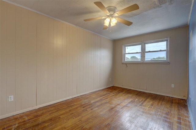 122-52 Springfield Blvd, Springfield Gardens, NY 11413 - empty room featuring hardwood / wood-style floors, ceiling fan, and baseboards