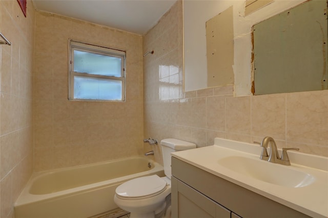 122-52 Springfield Blvd, Springfield Gardens, NY 11413 - full bath with tile walls, toilet, bathing tub / shower combination, vanity, and decorative backsplash