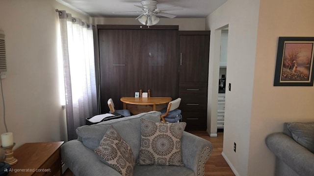 1115 Cherry Hill Dr, Poughkeepsie, NY 12603 - dining space with wood finished floors, a ceiling fan, and baseboards